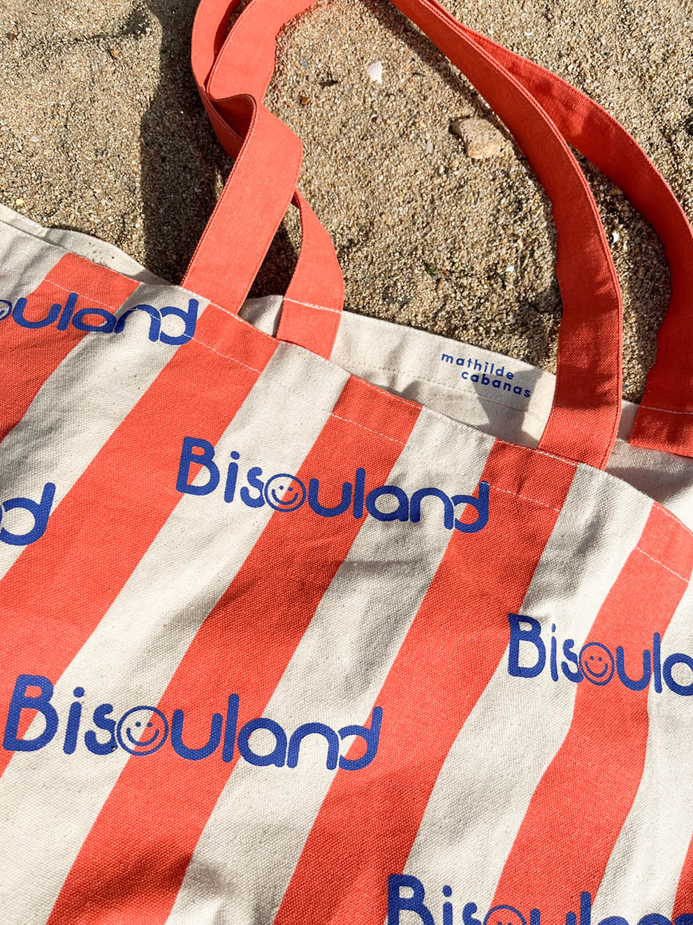 White and red Bisouland tote bag